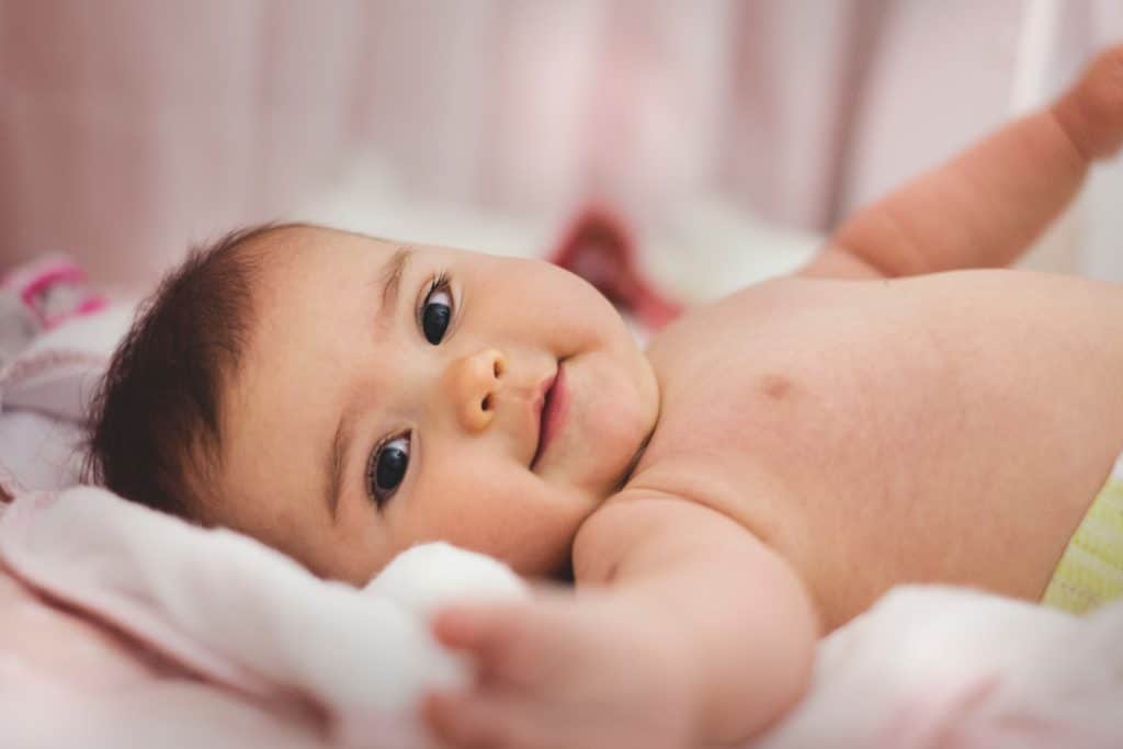 adorable baby smiling on camera