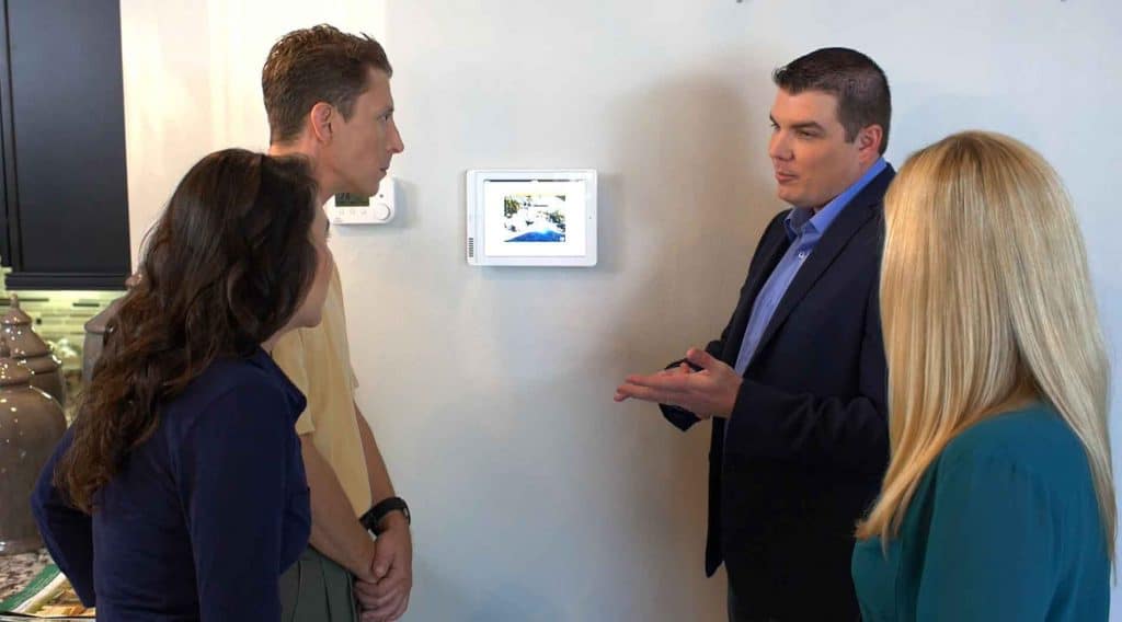 Couples Discussing Home Security System Options