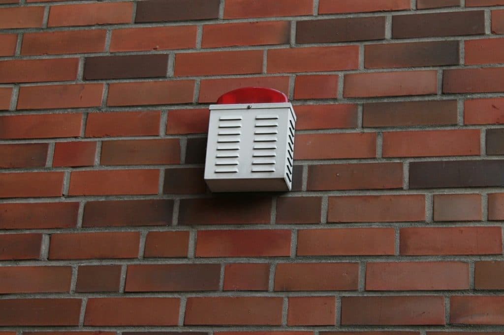External alarm on bricked wall