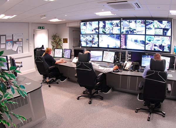 security personnels watching the cctv cameras' footage