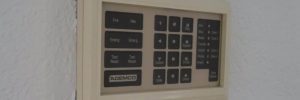 Old junky alarm system on wall