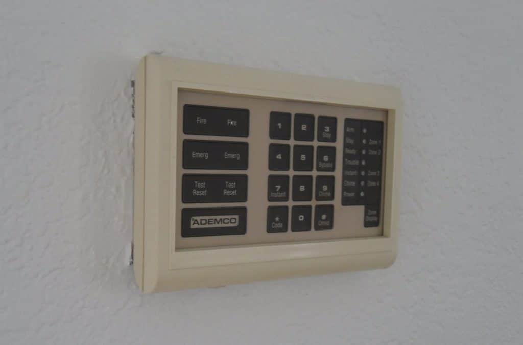 Old junky alarm system on wall