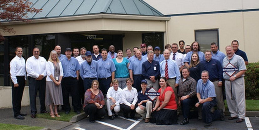 Group of Protection One workers and customer service agents