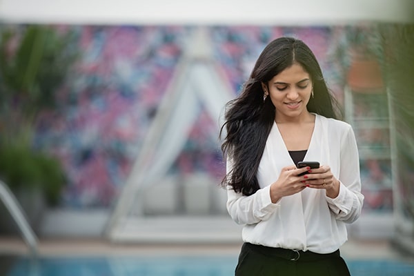 woman holding smartphone